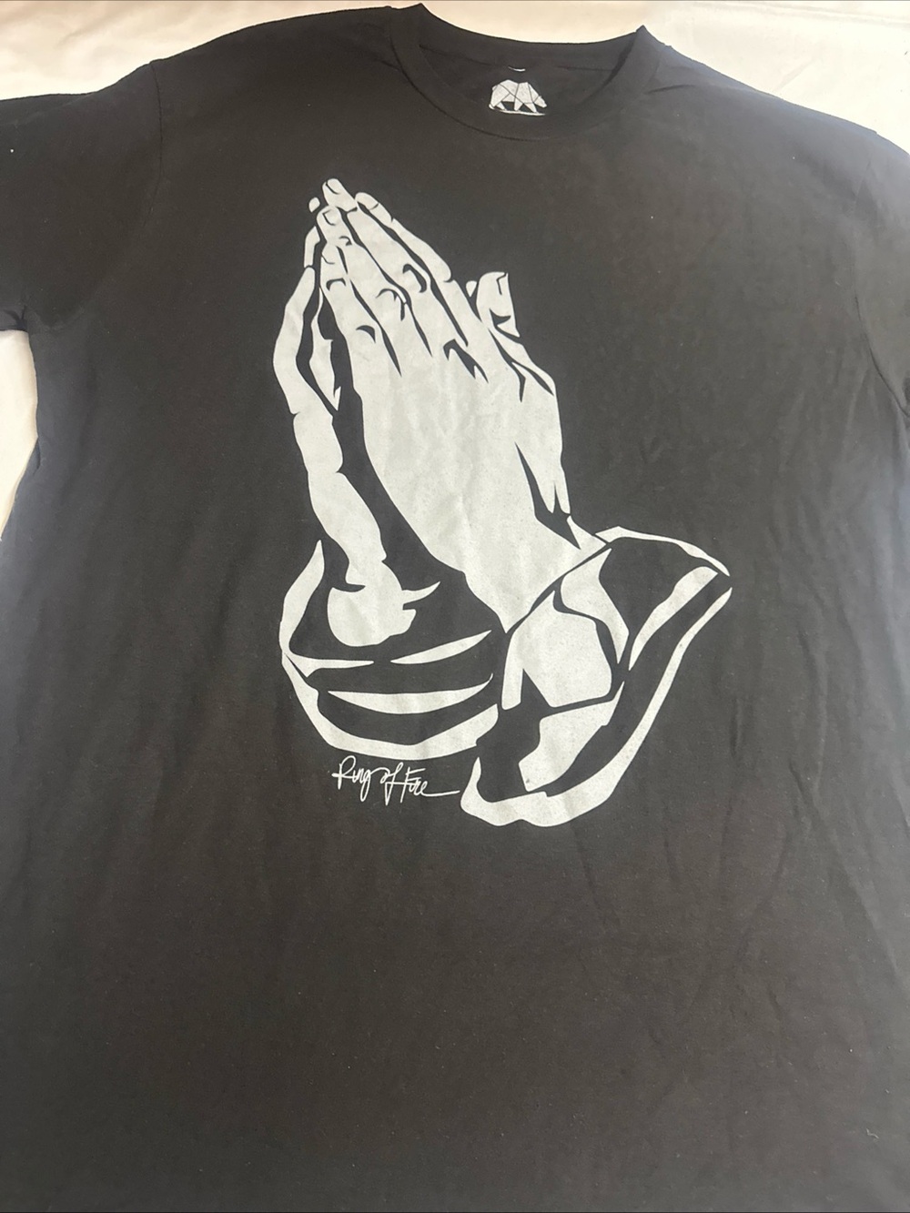 Ring of Fire Black Tee with White Prayer Hands Graphic